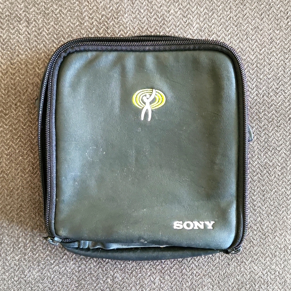 NWT Vintage Sony Black leather zip-up Discman carrying case and CD/DVD case. OS.